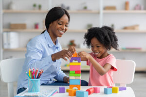 Therapist and child playing