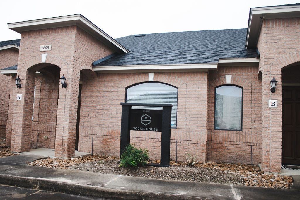 Social House Wellness building and sign at 1806 Snake River Road, with Suite B on the right.